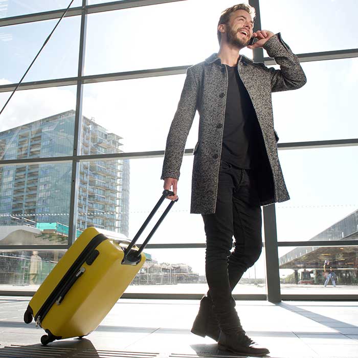 Man at airport wearing compression socks